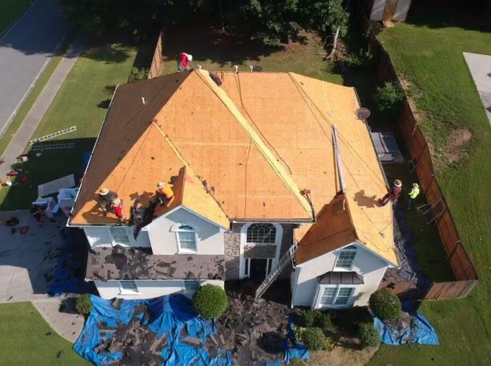 Top view of a residential roof replacement performed by Whitaker Roofing in Douglasville, GA.