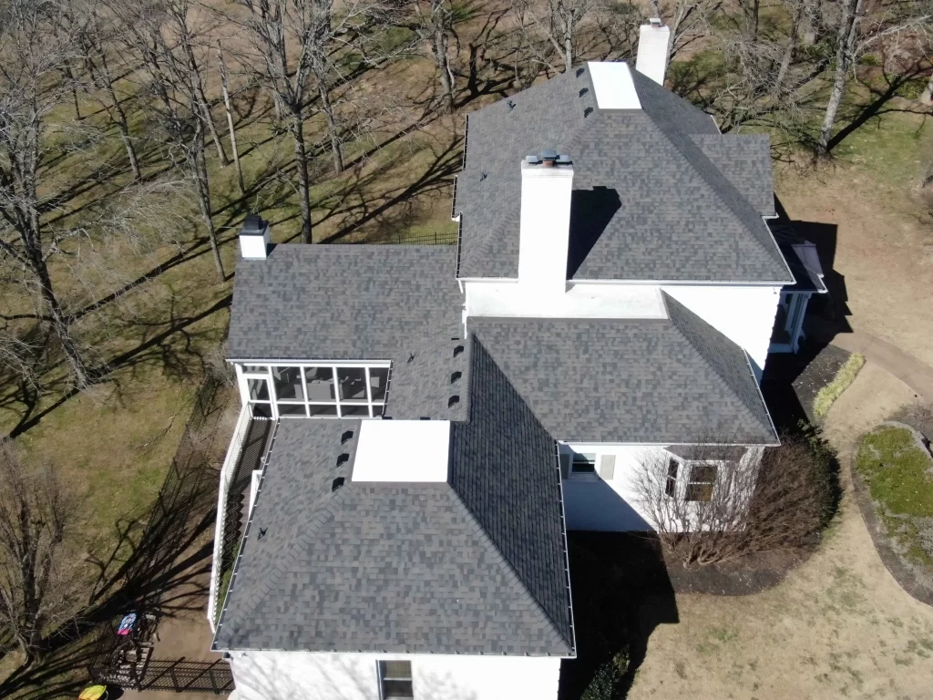 white house with new gray roof in Brentwood, TN